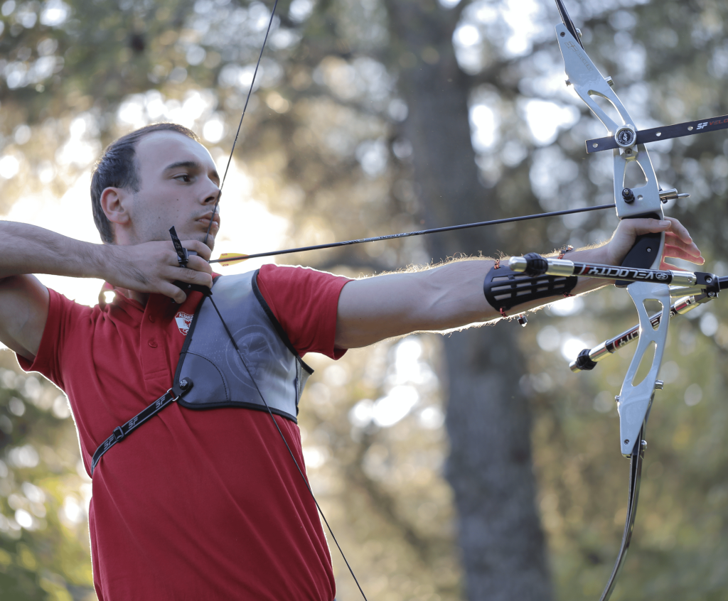 An archer with a hunting thumb release