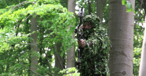 An image of a saddle hunter wearing a 3D hunting camo