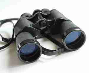 An image of a binoculars for hunting on a white surface